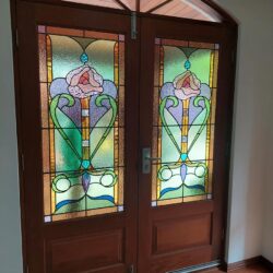 Timber door with stained glass window