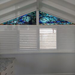 Studio gable stained glass seaweed inspired window